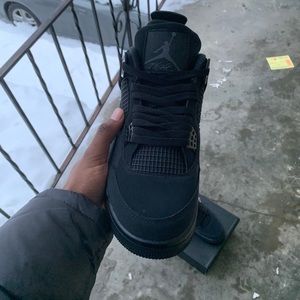 Black Cat Jordan 4s 2020 size 10